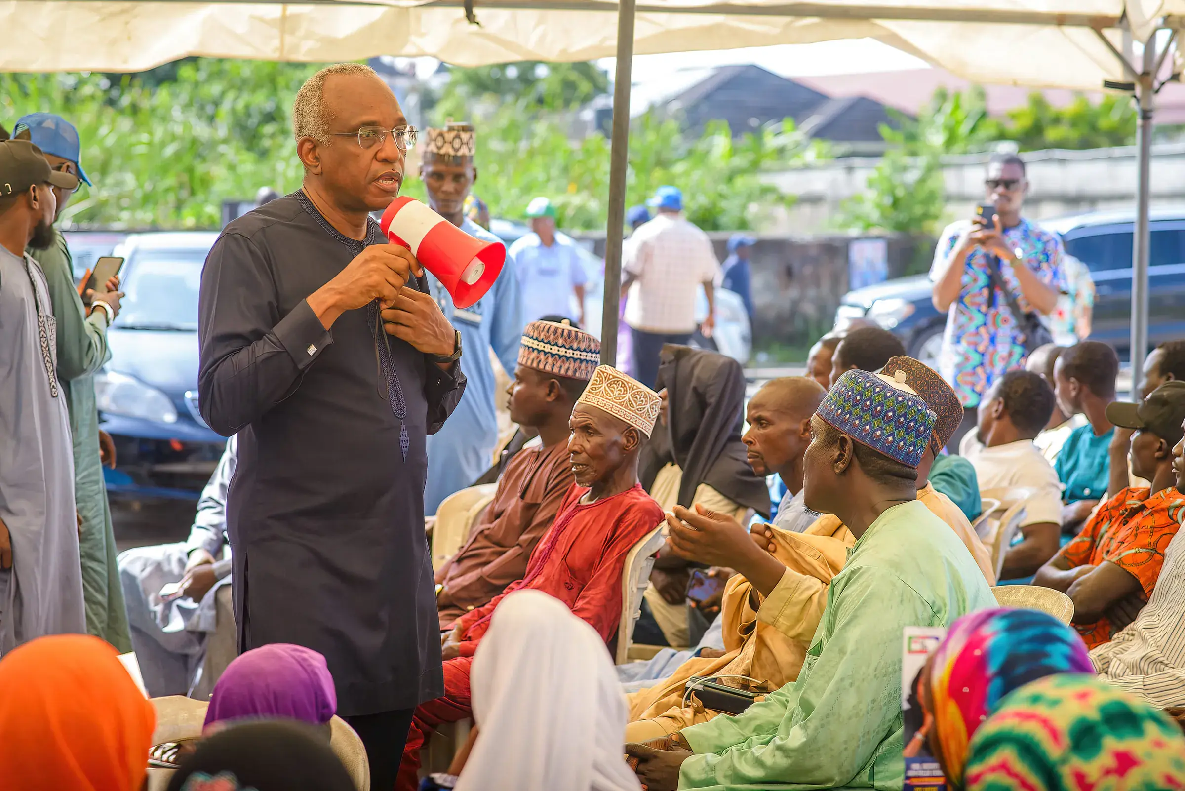 Funso Doherty with people at CCI Ikeja and the Arewa community meeting.
