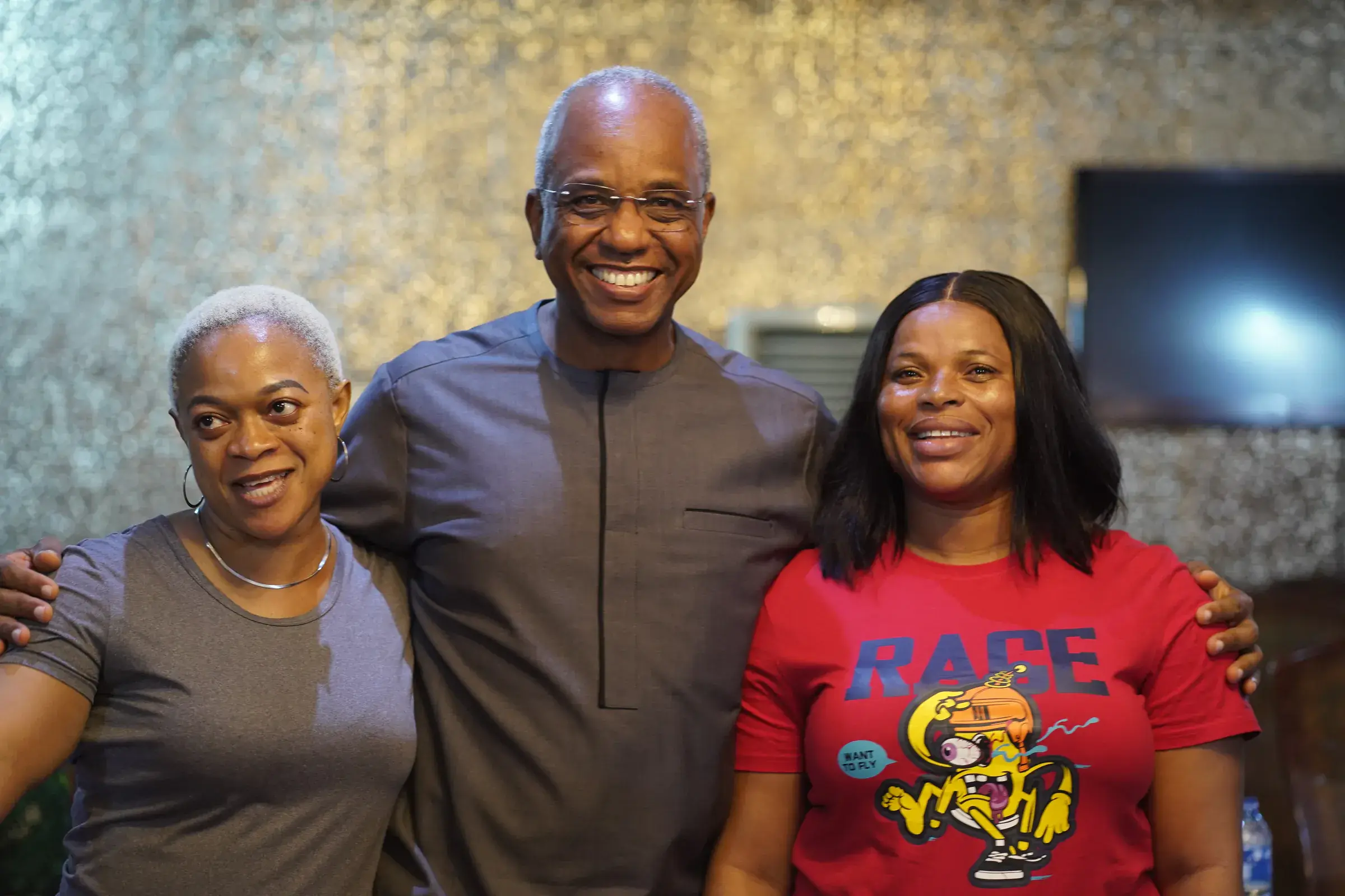 Funso Doherty with people at an NDC Lagos State executive meeting.